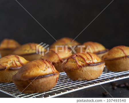 Pasticciotto leccese pastries filled with egg custard cream and sour cherry jam close up 107493540