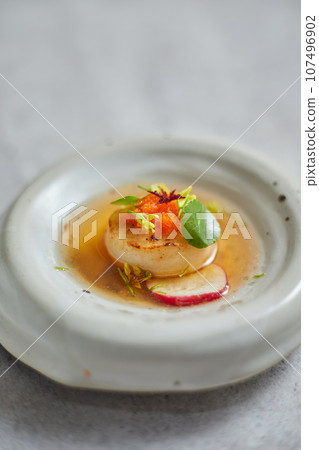 Beautiful and tasty food on a plate, exquisite dish Beautiful and tasty food on a plate, exquisite dish 107496902