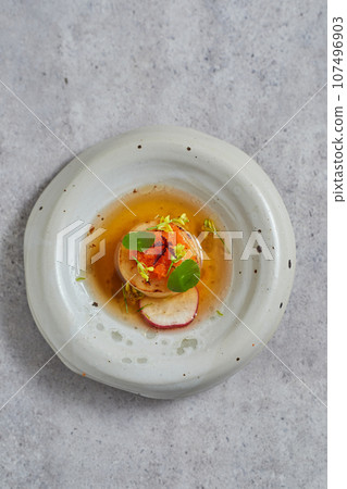 Beautiful and tasty food on a plate, exquisite dish Beautiful and tasty food on a plate, exquisite dish 107496903