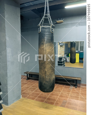 old beaten punching bag old beaten punching bag 107498695