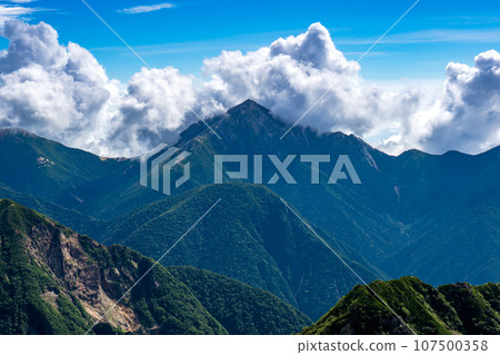 Mt. Yarigatake, Japan's 100 Famous Mountains in Nagano Prefecture, seen from the ridgeline of Mt. Minamidake and Mt. Nakadake. 107500358