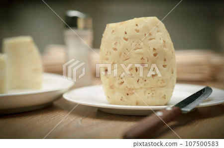 Cutting pineapple Cutting pineapple 107500583