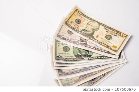 various bills on white background, exchange, spending, currency various bills on white background, exchange, spending, currency 107500670