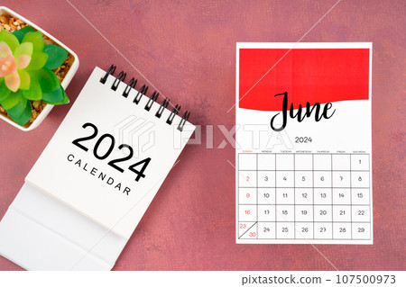 June 2024 calendar page with plant pot. 107500973