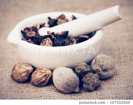 Triphala, a combination of ayurvedic fruits Triphala, a combination of ayurvedic fruits 107502089