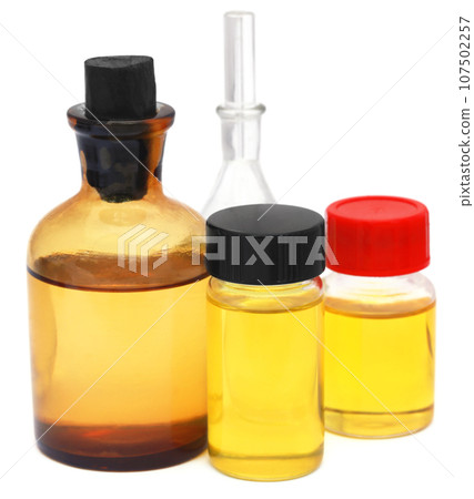 Oil jars over white background 107502257