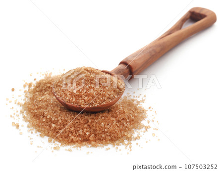 Brown sugar with wooden scoop Brown sugar with wooden scoop 107503252