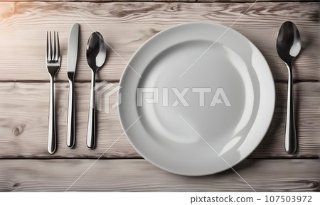 Empty plate in restaurant, versatile product mockup 107503972
