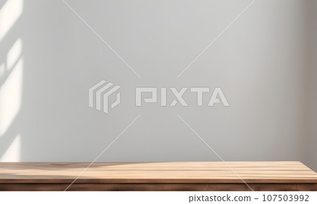 Wooden table and sunlit wall, product mockup template 107503992