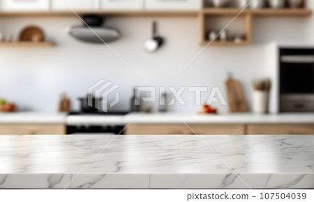 Empty kitchen table and blurred kitchen background Empty kitchen table and blurred kitchen background 107504039