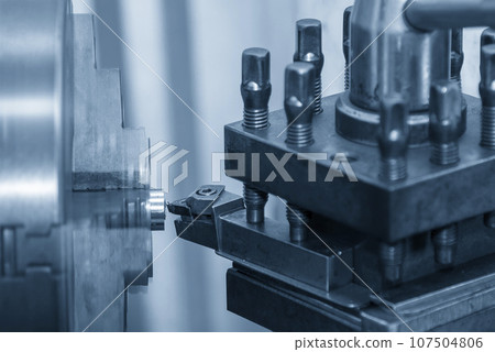 Close up scene the lathe machine rough cut  metal tube parts. 107504806