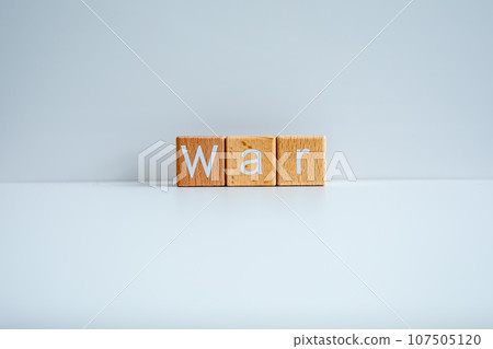 Wooden blocks form the text "War" against a white background. 107505120