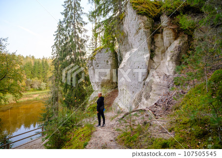 Sand cliff Sietiniezis on the bank of the Gauja river. Gauja National Park, Latvia 107505545