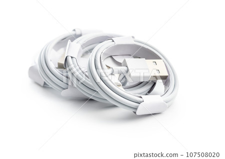 White usb charging cables isolated on white background. White usb charging cables isolated on white background. 107508020