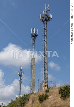 5G radio network telecommunication equipment with radio modules and smart antennas mounted on a metal 5G radio network telecommunication equipment with radio modules and smart antennas mounted on a metal 107508129