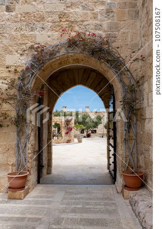Malta, Birgu, gate leading to a courtyard with buildings inside at Fort St Angelo. 107508167
