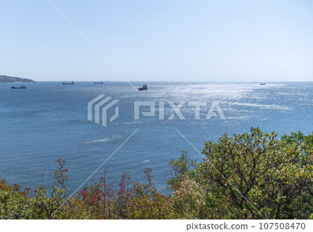 Large cargo ship in the Black Sea in the calm in Novorossiysk Large cargo ship in the Black Sea in the calm in Novorossiysk 107508470
