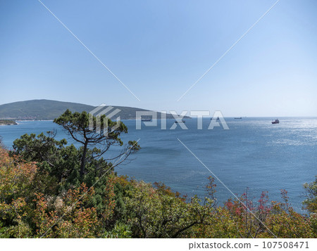 Large cargo ship in the Black Sea in the calm in Novorossiysk Large cargo ship in the Black Sea in the calm in Novorossiysk 107508471