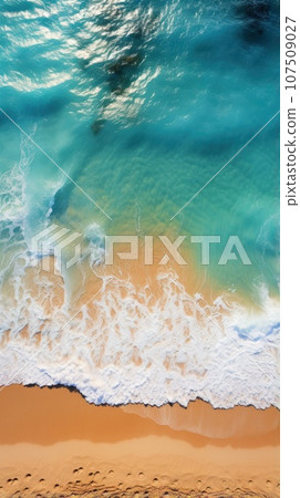 Aerial shot of a crowded beach with swimmers enjoying the waves Aerial shot of a crowded beach with swimmers enjoying the waves 107509027