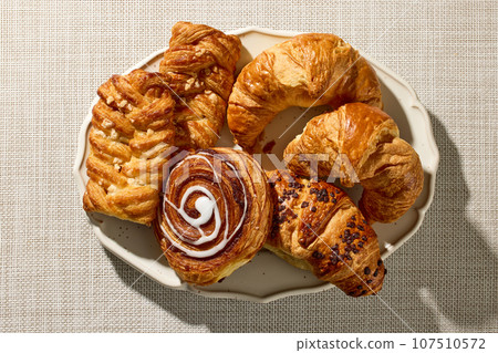 plate of assorted pastries 107510572