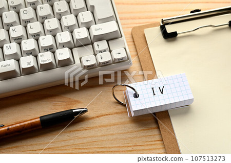 A desk with a deck of cards marked IV 107513273