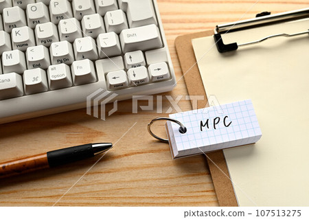 A desk with a word book written as MPC A desk with a word book written as MPC 107513275