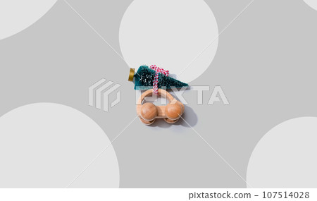 Wooden toy car carrying Christmas tree Wooden toy car carrying Christmas tree 107514028