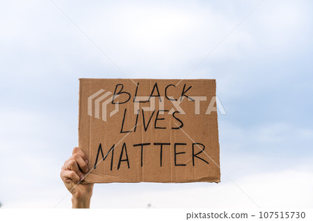 banner in hand black lives matter against the sky banner in hand black lives matter against the sky 107515730