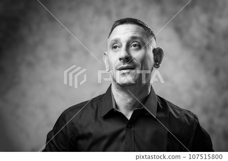 black and white portrait of a man in a shirt black and white portrait of a man in a shirt 107515800