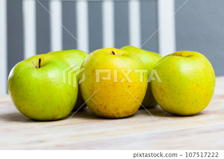 Ripe green and yellow apples Ripe green and yellow apples 107517222