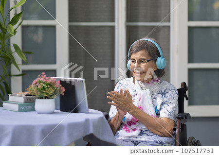 Music therapy in dementia treatment on elderly woman. 107517731