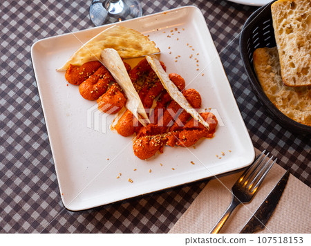 Muhamara - cream of hot pepper and walnut with Arabic bread 107518153