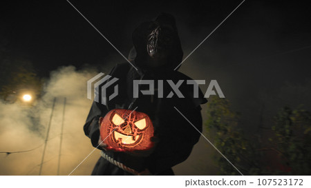 Monk And Monster Walk For Halloween In The Foggy Night Forest 107523172