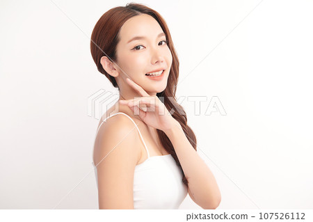 Beautiful young asian woman with clean fresh skin on white background, Face care, Facial treatment, Cosmetology, beauty and spa, Asian women portrait. Beautiful young asian woman with clean fresh skin on white background, Face care, Facial treatment, Cosmetology, beauty and spa, Asian women portrait. 107526112