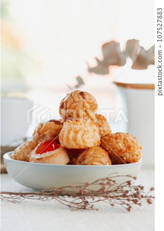 bowl with some panellets typical of Catalonia, Spain 107527883
