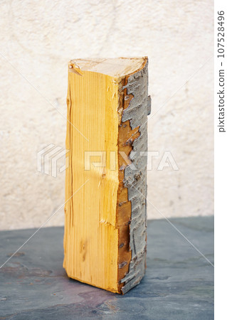 single piece of firewood 107528496