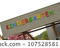 Colorful letters spelling Kindergarten on building 107528581