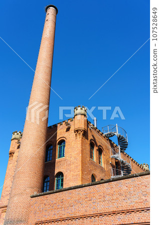 red brick building with staircase and tower red brick building with staircase and tower 107528649