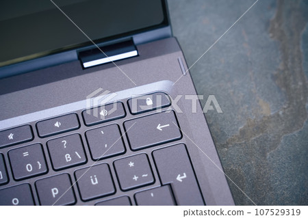 lock key on a notebook keyboard 107529319