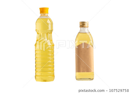 Vegetable oil with olive oil in different bottle for cooking isolated on white background with clipping path. 107529758