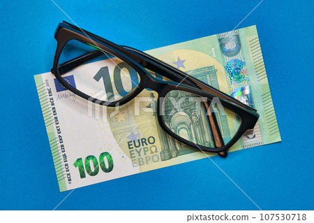 glasses and eye glasses with euro banknotes glasses and eye glasses with euro banknotes 107530718