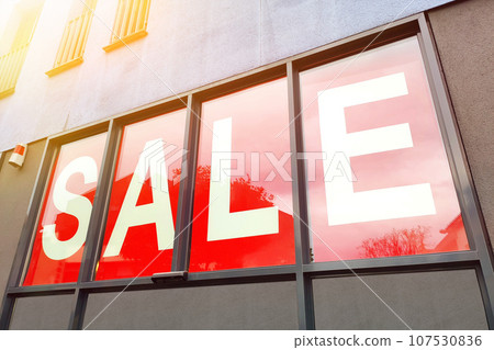 red sale sign at a shop in germany 107530836