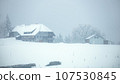 winter snow farmhouse in the Black Forest area south Germany 107530845