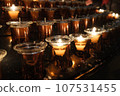 some candles in the church 107531455