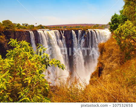 Majestic view of Victoria Falls from Zimbabwe to Zambia side in dry season Majestic view of Victoria Falls from Zimbabwe to Zambia side in dry season 107532658