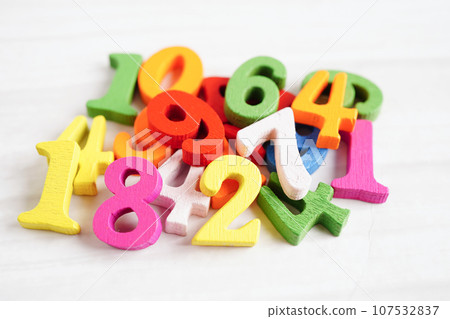 Number wood block cubes for learning Mathematic, education math concept. 107532837