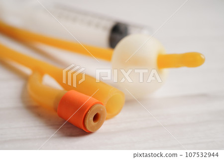 Foley catheter and urine drainage bag collect urine for disability or patient in hospital. 107532944