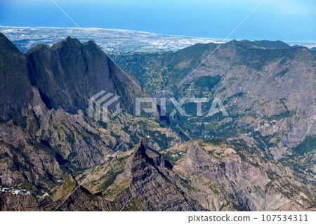 Mountain ranges in Reunion Island from above Mountain ranges in Reunion Island from above 107534311