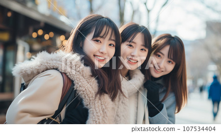 Two Japanese women go to Hokkaido during winter vacation 107534404