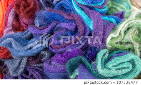 Basket with rainbow fabrics. Colored fabrics. Homemakers' Market 107538477